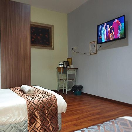 Oyo 90964 Melody 88 Inn Miri Exteriör bild